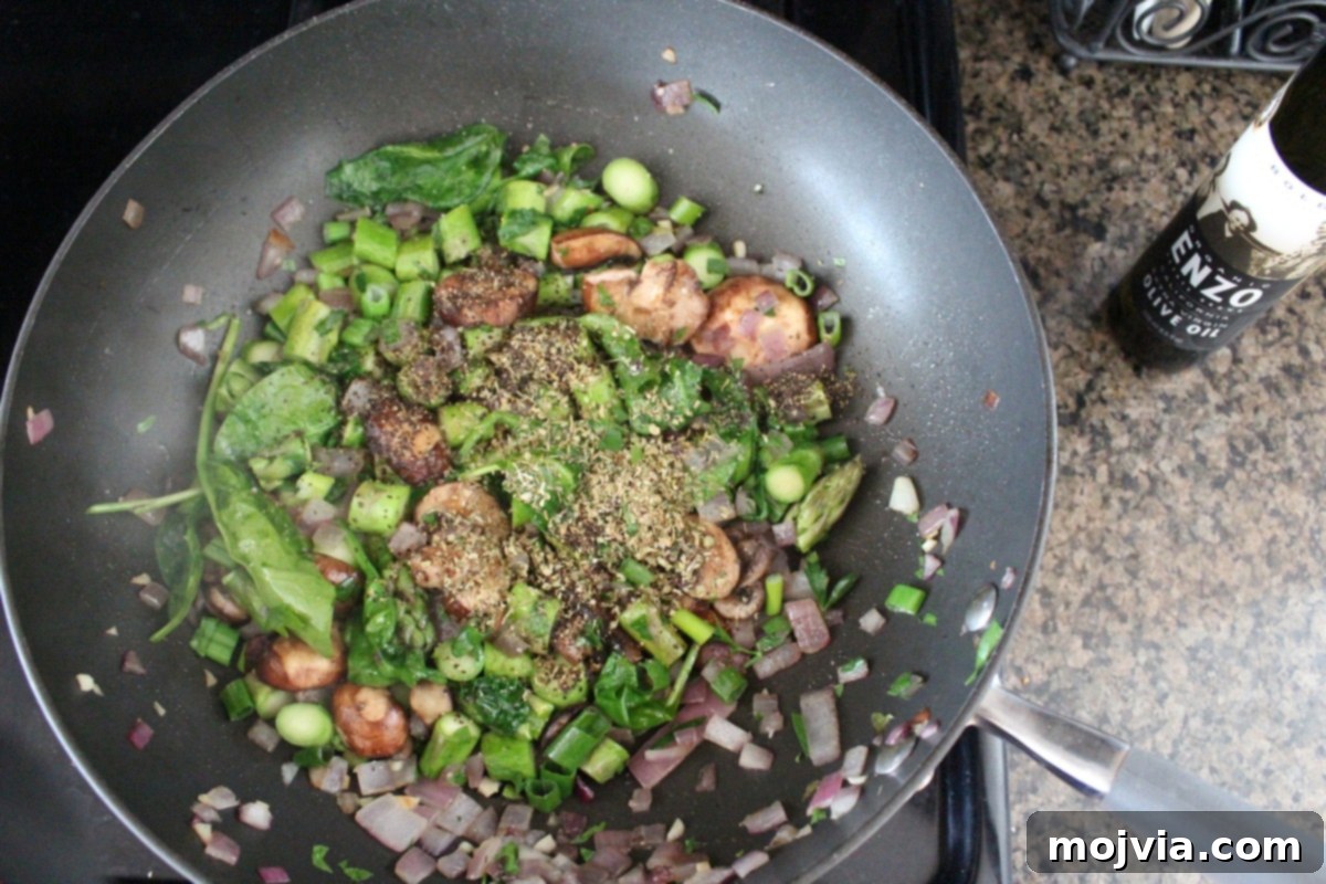 Vibrant Spring Garden Gluten Free Stuffing 5 Adding fresh and dried herbs to the sautéed vegetables
