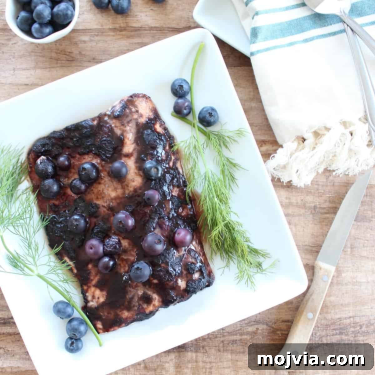 Blueberry BBQ Glazed Grilled Salmon 2 Blueberry BBQ Salmon Recipe - Fresh Grilled Salmon with a sweet and tangy blueberry barbecue sauce, perfect for a healthy and easy meal.