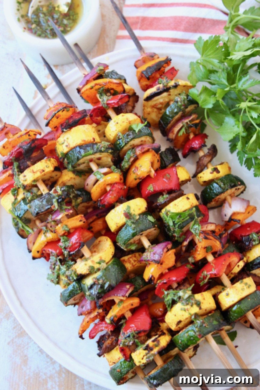 Vibrant Grilled Vegetable Skewers 2 Grilled Vegetable Skewers served on a white plate, highlighting their colorful arrangement and perfectly charred edges.