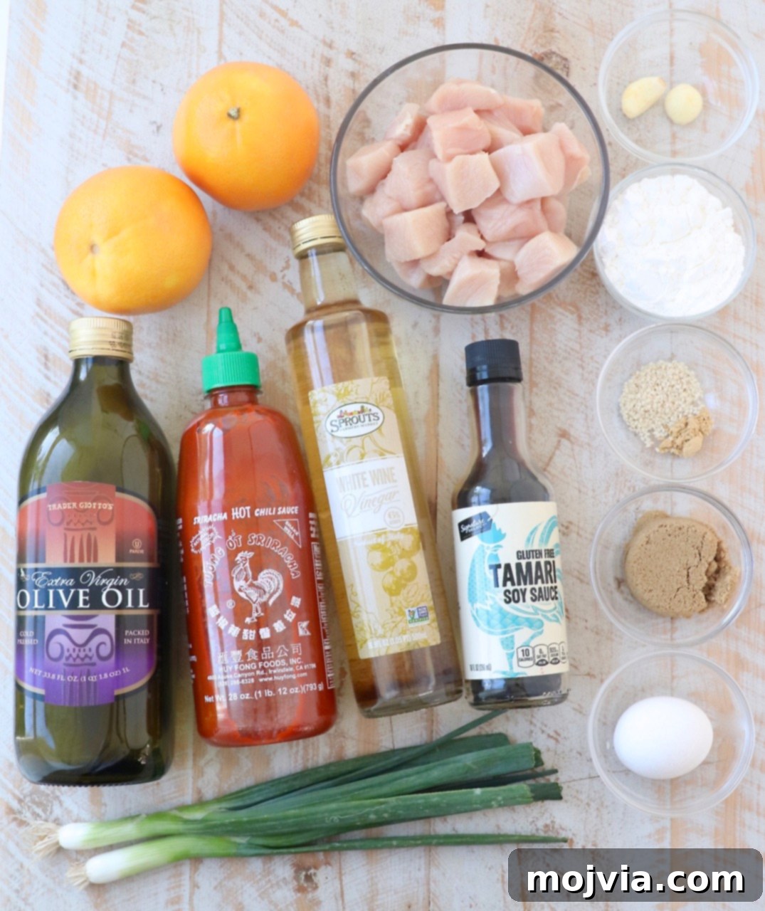 Zesty Gluten-Free Orange Chicken 3 Ingredients laid out for orange chicken recipe