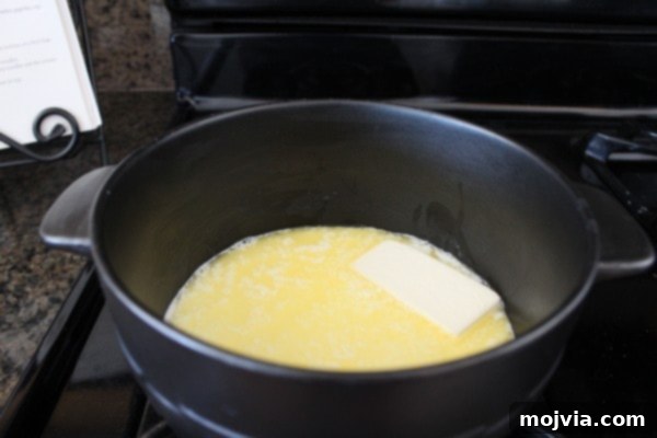 Melted butter in a pot for Alfredo sauce.