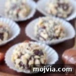 Chocolate bonbons rolled in chopped hazelnuts