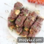 Sriracha Steak Wrapped Jalapeño Poppers