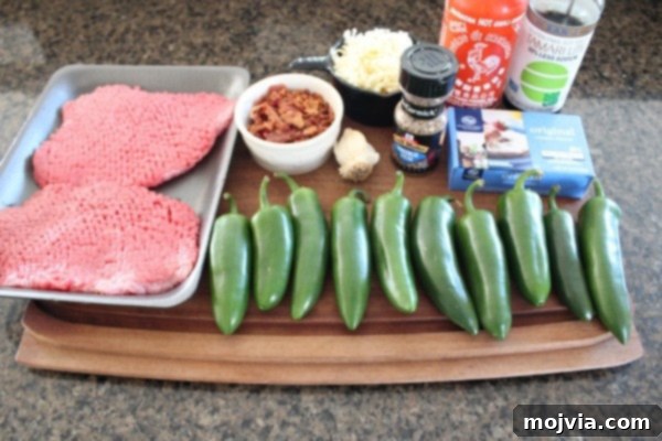 Smoky Sriracha Steak Popper Skewers 6 Ingredients laid out for Sriracha Steak Wrapped Jalapeño Poppers