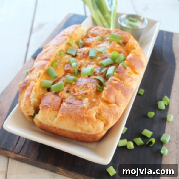 Loaded Baked Potato Bread on a serving board
