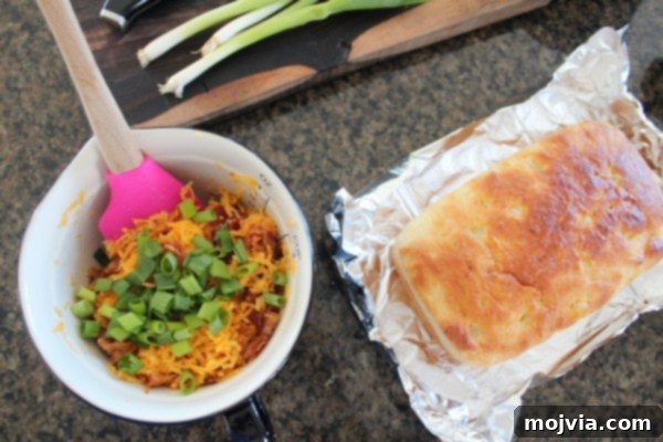 Mixing cheese, bacon, and green onions