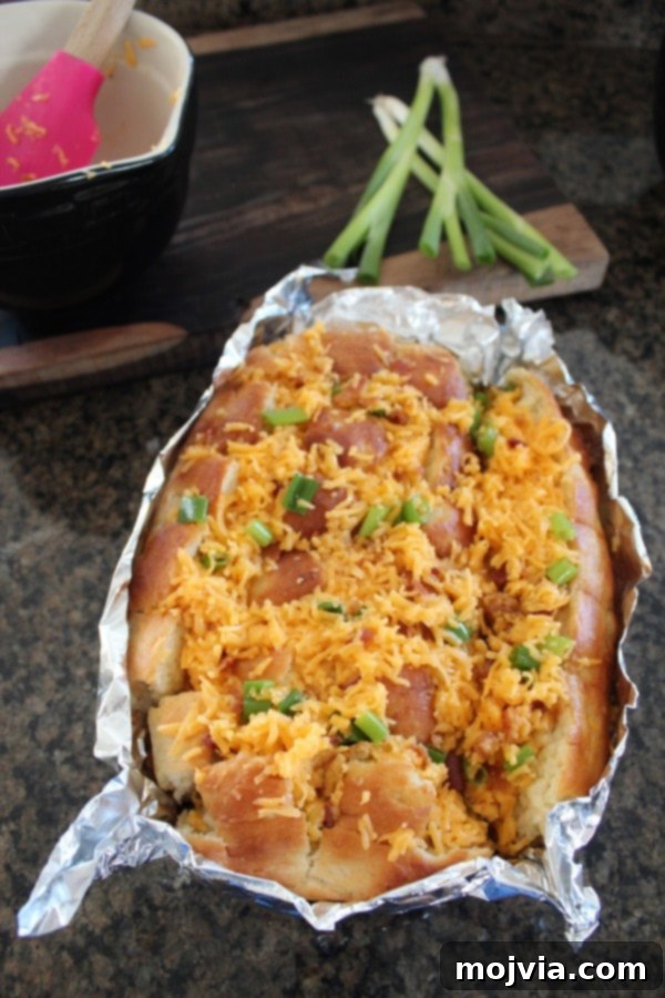 Stuffing the bread with cheesy bacon mixture