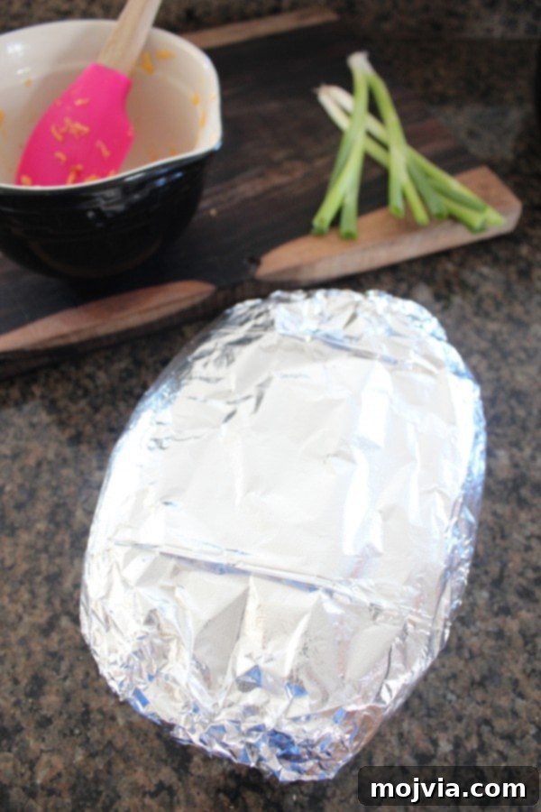 Foil-wrapped bread ready for baking