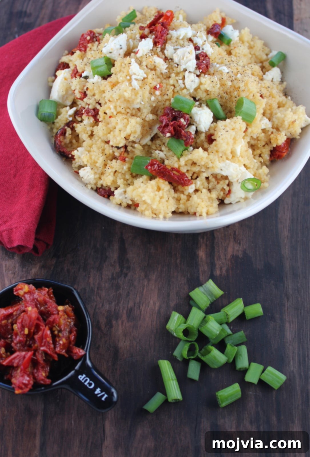 Finished Mediterranean Couscous salad with feta cheese, a vibrant and delicious dish ready to be served
