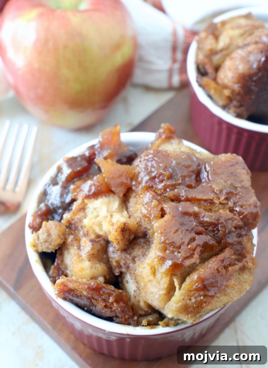 Pumpkin apple monkey bread served in individual red bowls, ready to be enjoyed.