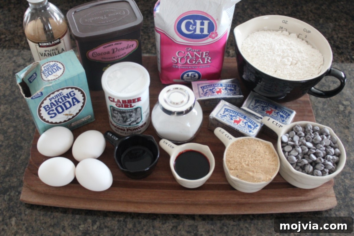 Ruby Red Brookie Bliss 3 Red Velvet Brookies Ingredients laid out on a wooden cutting board, ready for preparation