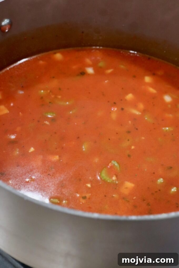 Braised Pork Ragu 7 tomato sauce and vegetables in pot