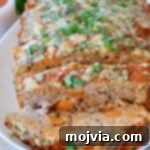sliced buffalo chicken meatloaf on plate