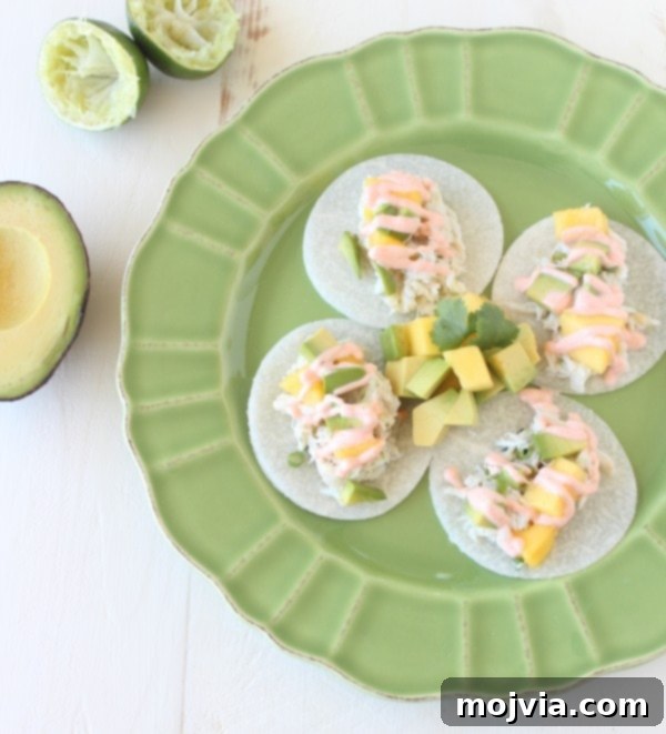 Crisp Jicama Crab Tacos 6 Beautifully plated Jicama Crab Tacos with spicy lime aioli drizzle, ready to be enjoyed
