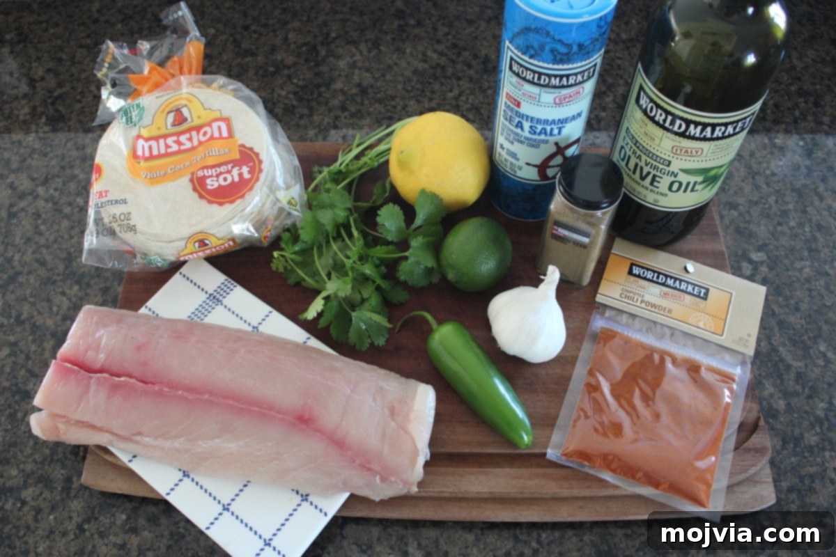 Mahi Mahi Fish Tacos Ingredients on a wood board