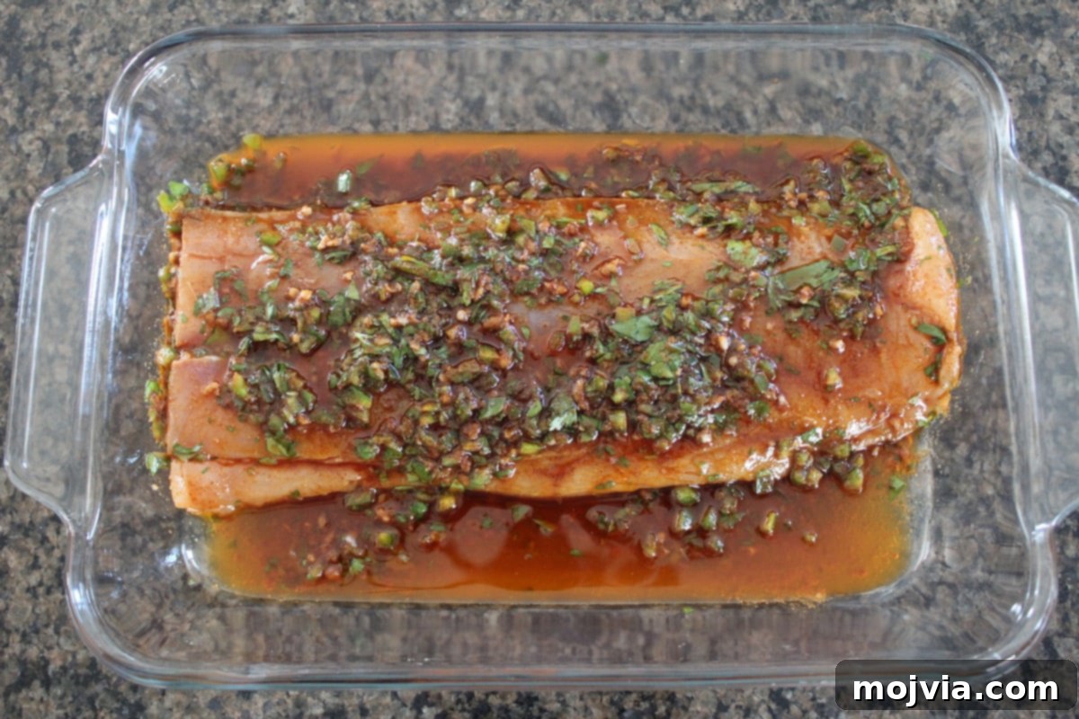 marinating fish in glass dish