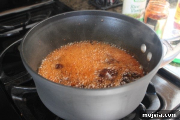 Gochujang Glazed Salmon 5 Homemade Korean BBQ Sauce Simmering in a Pan