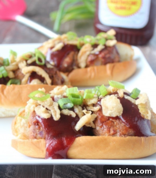 Smoky BBQ Meatball Hero 8 Assembled BBQ Meatball Subs with melted cheese