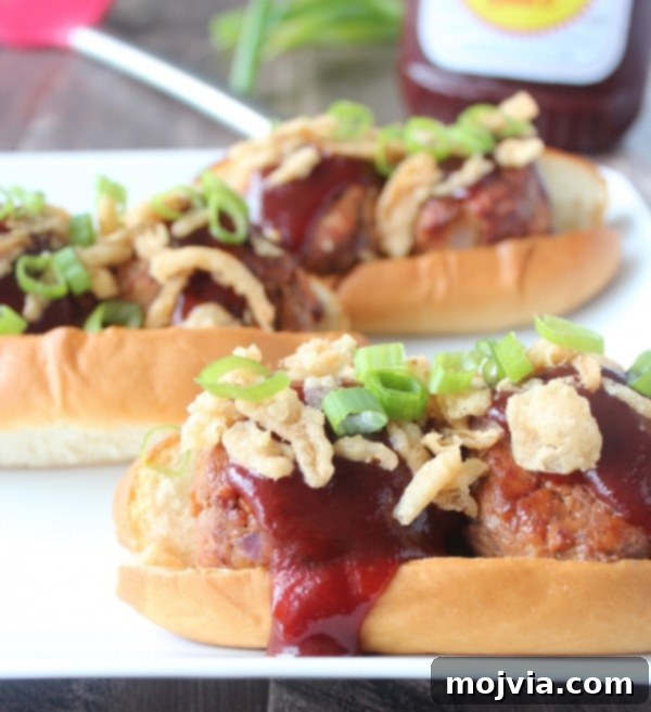 Smoky BBQ Meatball Hero 10 Close-up of a BBQ Meatball Sub with crispy fried onions