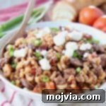Mediterranean Lamb Pasta Skillet 5 Ground lamb pasta in bowl with spoon