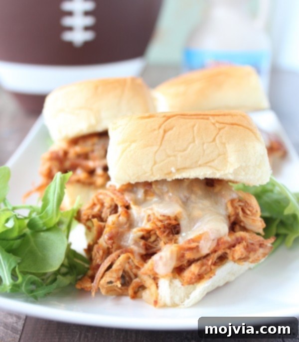 Smoky Sweet Chipotle Pulled Chicken Sliders 2 Delicious Slow Cooked Chipotle Maple Shredded Chicken Sliders on Hawaiian rolls