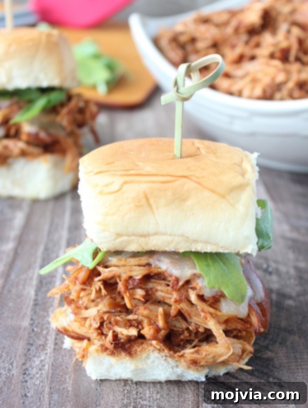 Smoky Sweet Chipotle Pulled Chicken Sliders 10 Top view of Slow Cooked Chipotle Maple Shredded Chicken Slider with a vibrant presentation