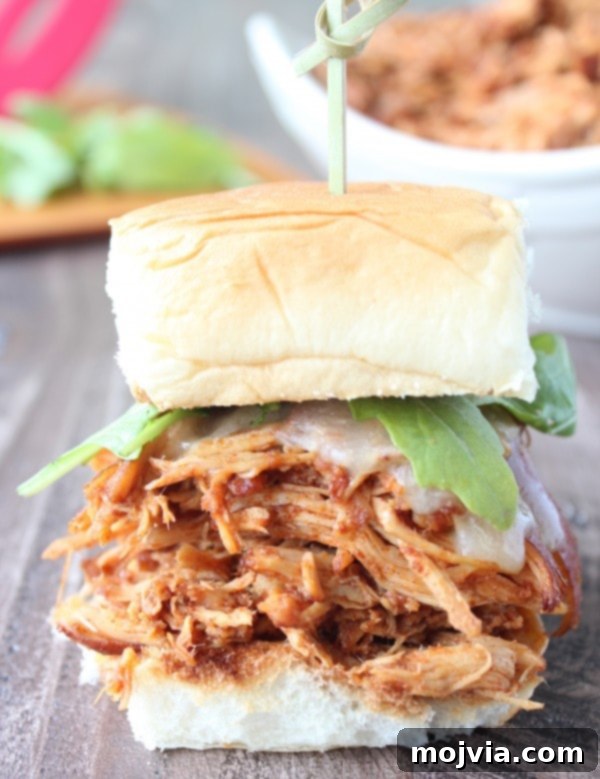 Smoky Sweet Chipotle Pulled Chicken Sliders 3 Close-up of Slow Cooked Chipotle Maple Chicken Sliders with melted cheese
