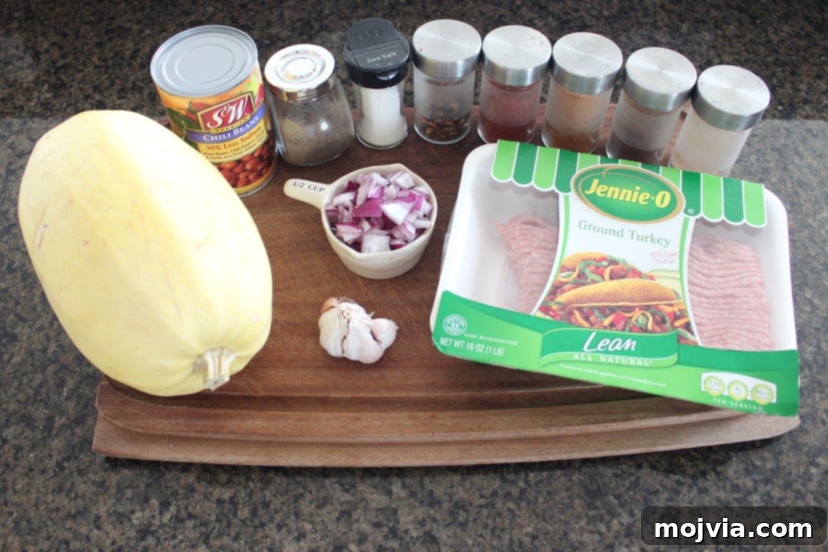 Turkey Chili Spaghetti Squash Bowls 3 Fresh ingredients laid out on a wooden board for Turkey Chili Spaghetti Squash