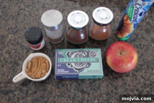 Creamy Apple Cinnamon Danish Delight 5 Ingredients for Apple Cinnamon Cream Cheese Danish laid out on a table