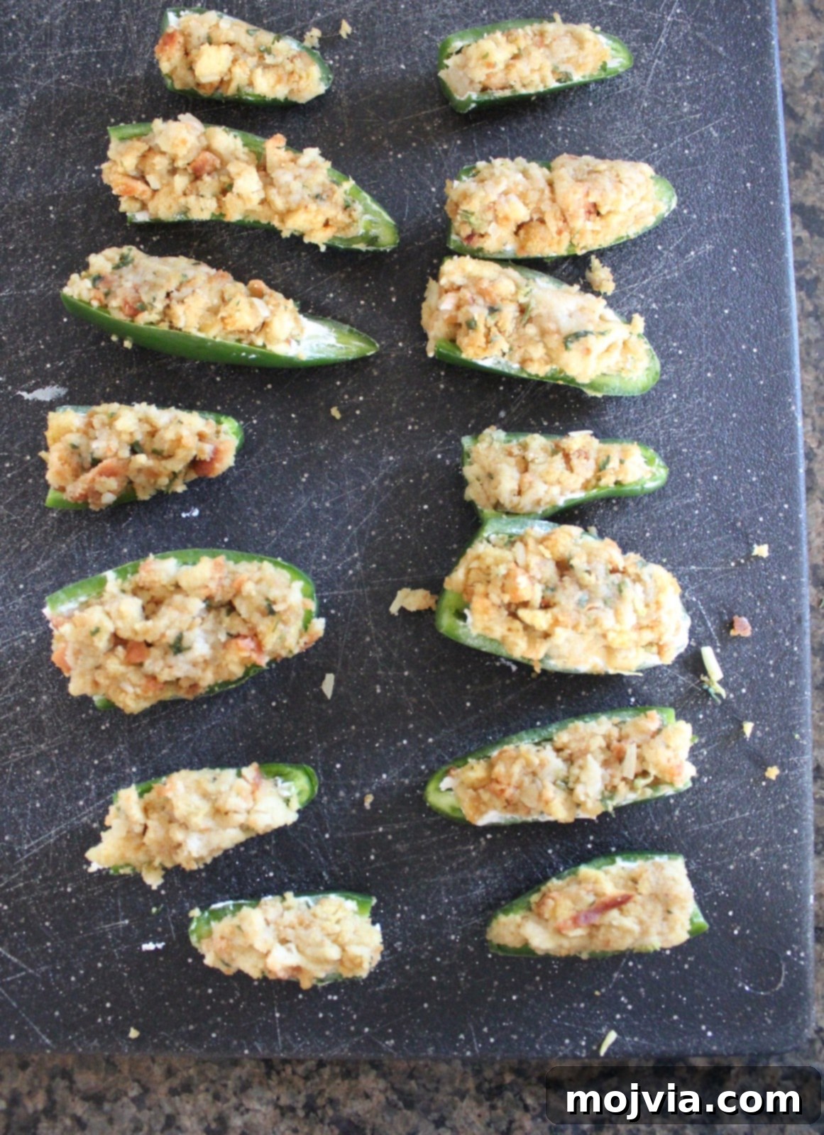 Explosive Cream Cheese Jalapeno Bites 7 Stuffing the jalapenos with a layer of savory stuffing.