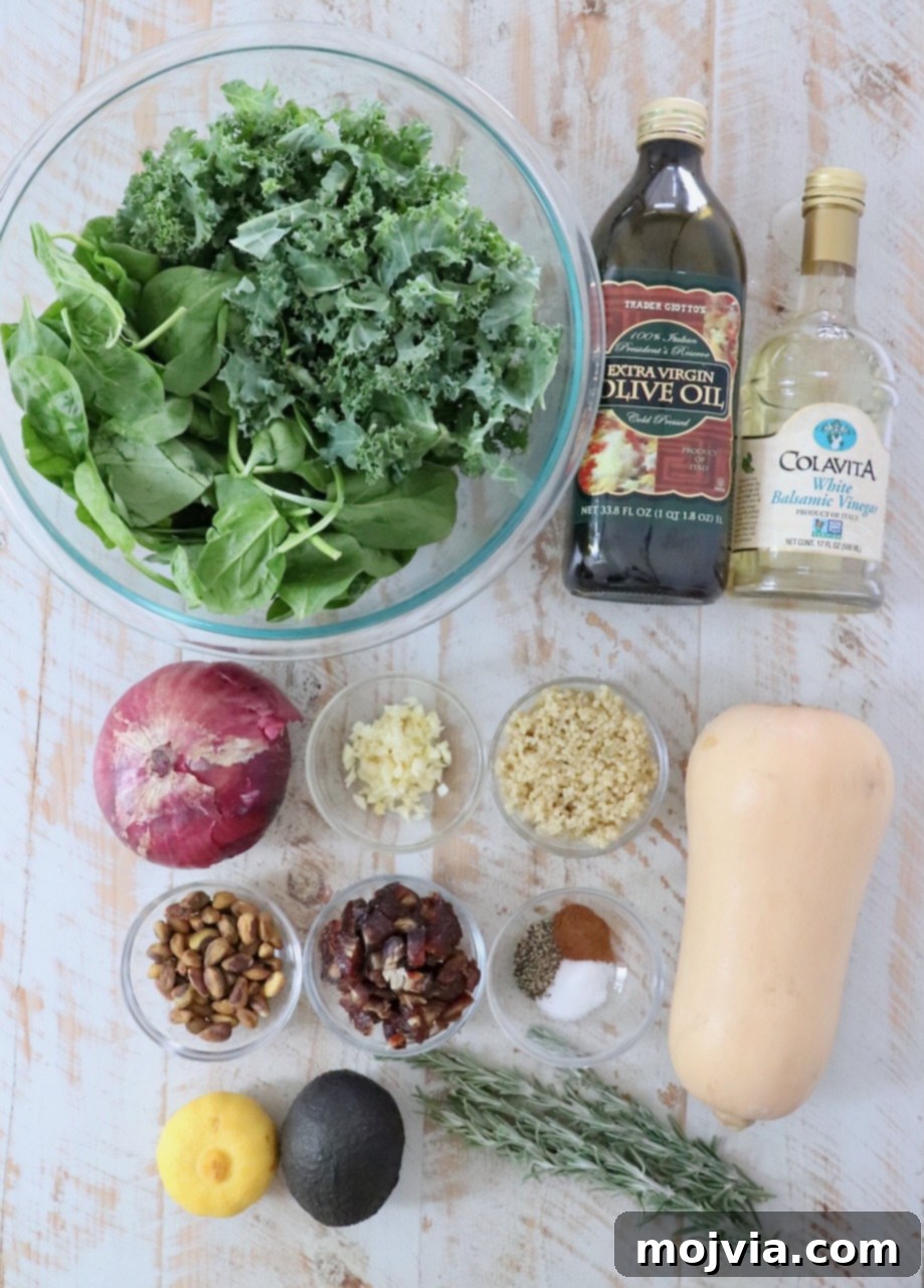 Golden Roasted Butternut Salad 3 butternut squash salad ingredients laid out on a white wood board