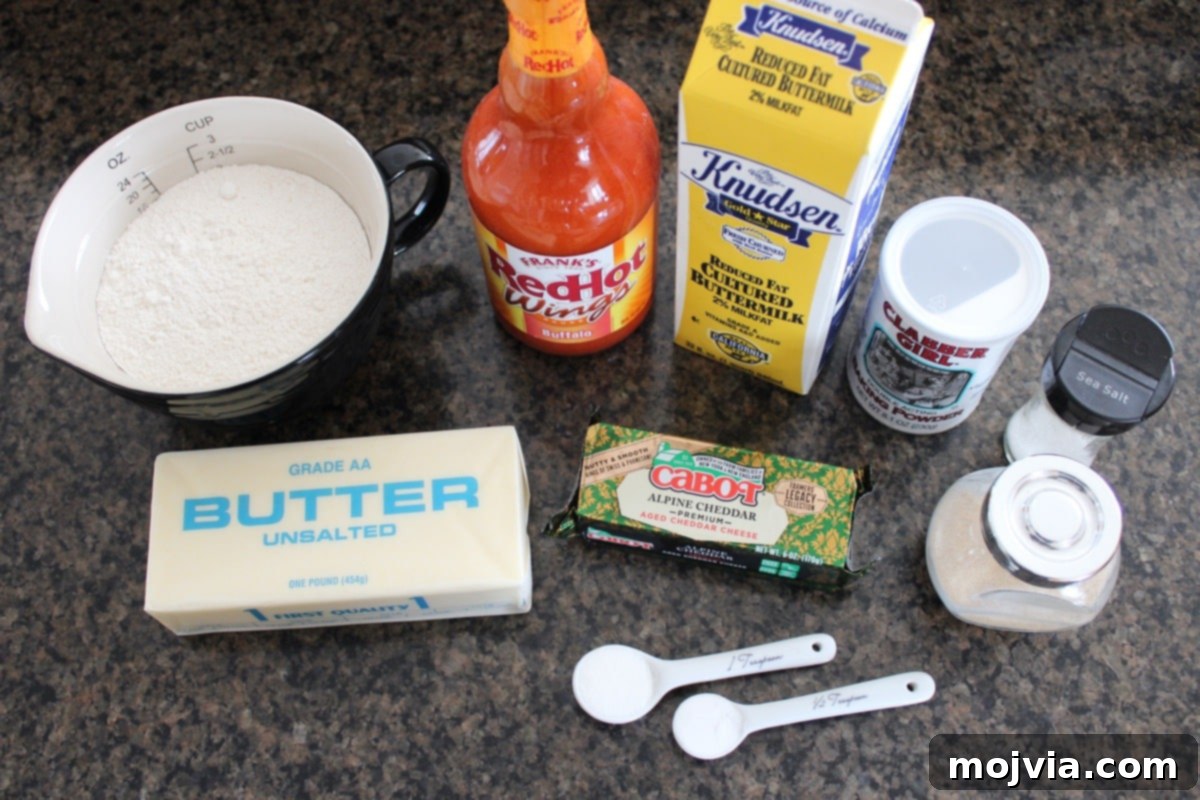 Buffalo Cheddar Zingers 3 Buffalo Cheddar Biscuit Recipe Ingredients on a granite countertop