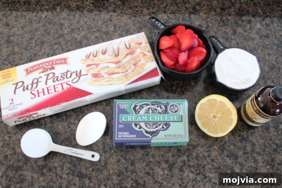 Strawberry Cheesecake Puff Pastry Hearts 4 Ingredients laid out for Heart Shaped Strawberry Cheesecake Puff Pastry Pies