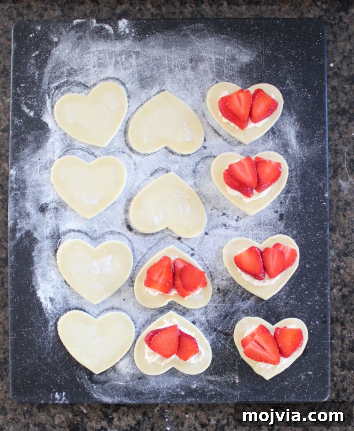 Strawberry Cheesecake Puff Pastry Hearts 10 Placing strawberry mixture on top of cream cheese filling