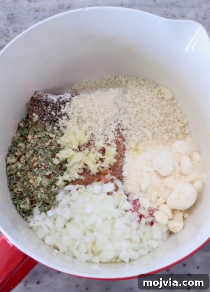 Set-and-Forget Slow Cooker Meatballs and Marinara 6 ingredients for Italian meatballs in large mixing bowl