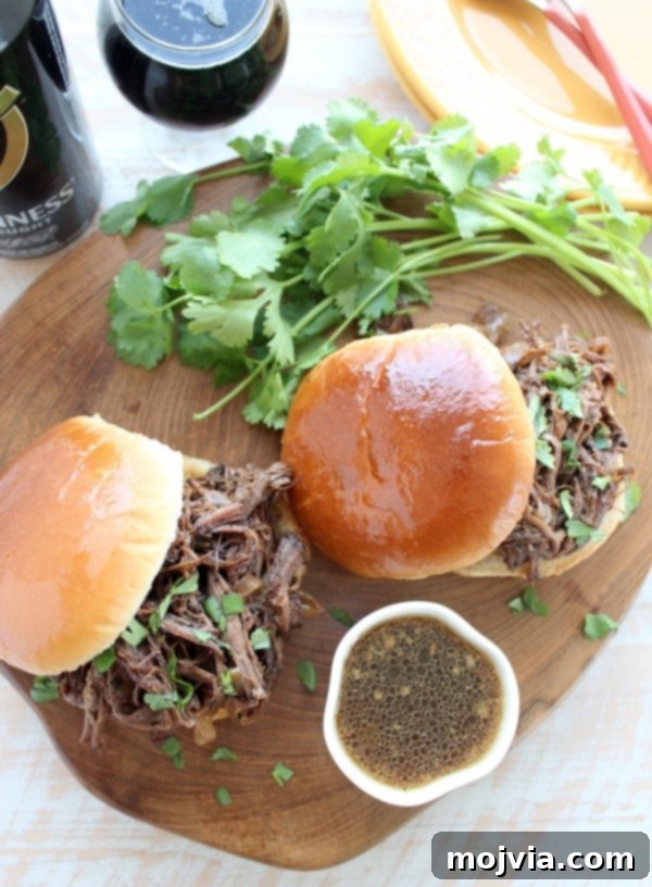 Delicious Slow Cooker Coffee Guinness Brisket served on buns