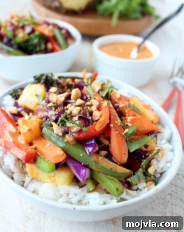 Vibrant Thai Peanut Pineapple Bowl 2 Vibrant Thai Peanut Pineapple Veggie Rice Bowl ready to be served