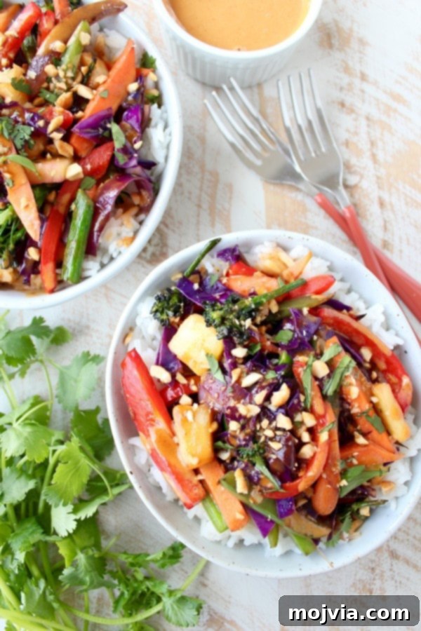 Vibrant Thai Peanut Pineapple Bowl 3 Overhead view of a beautiful Thai Peanut Pineapple Veggie Rice Bowl