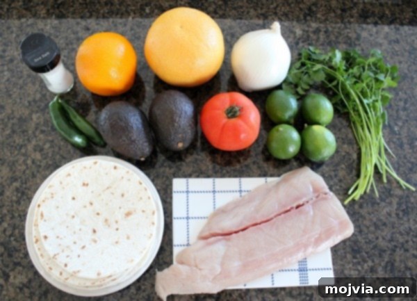 Fiesta Ceviche Bowls 5 All the fresh ingredients for Mahi Mahi Ceviche Taco Bowls laid out on a cutting board
