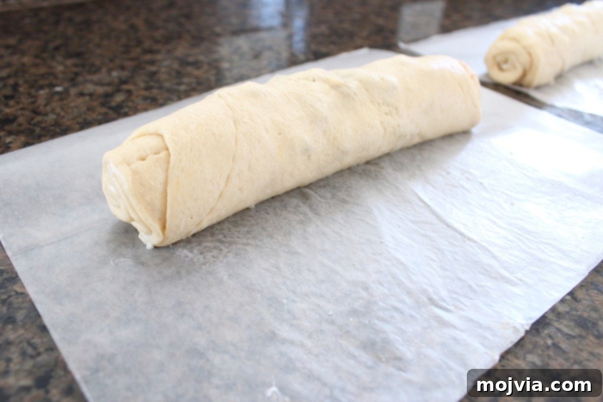 Crescent roll dough tightly rolled with the s'mores filling.