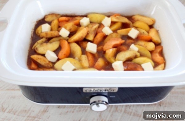 Effortless Fruit-Filled Dessert Shells 5 cooked sliced fruit in a crock pot with sugar and cubes of butter