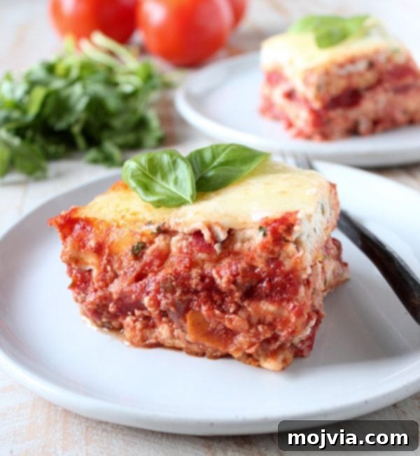 Delicious Garlic Naan Lasagna baked to perfection with bubbling cheese