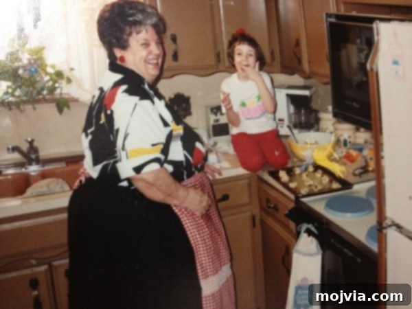 A nostalgic photo of a young girl baking cookies with her Grandma Meme, sharing a moment in the kitchen.