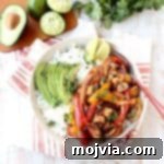 Sizzling Turkey Fajita Rice Bowl 8 This turkey fajita rice bowl recipe is easy to make & the perfect use for leftover turkey at Thanksgiving, but makes a delicious meal anytime of the year!