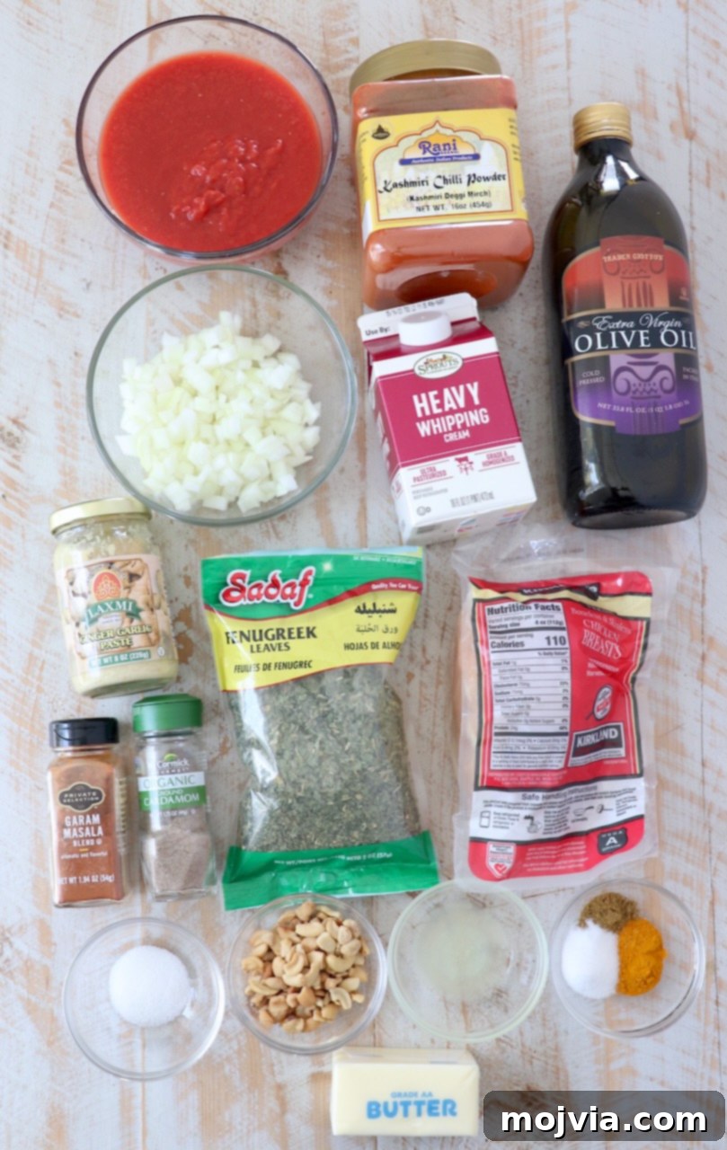 Velvet Butter Chicken 3 ingredients for Indian butter chicken on white wood board