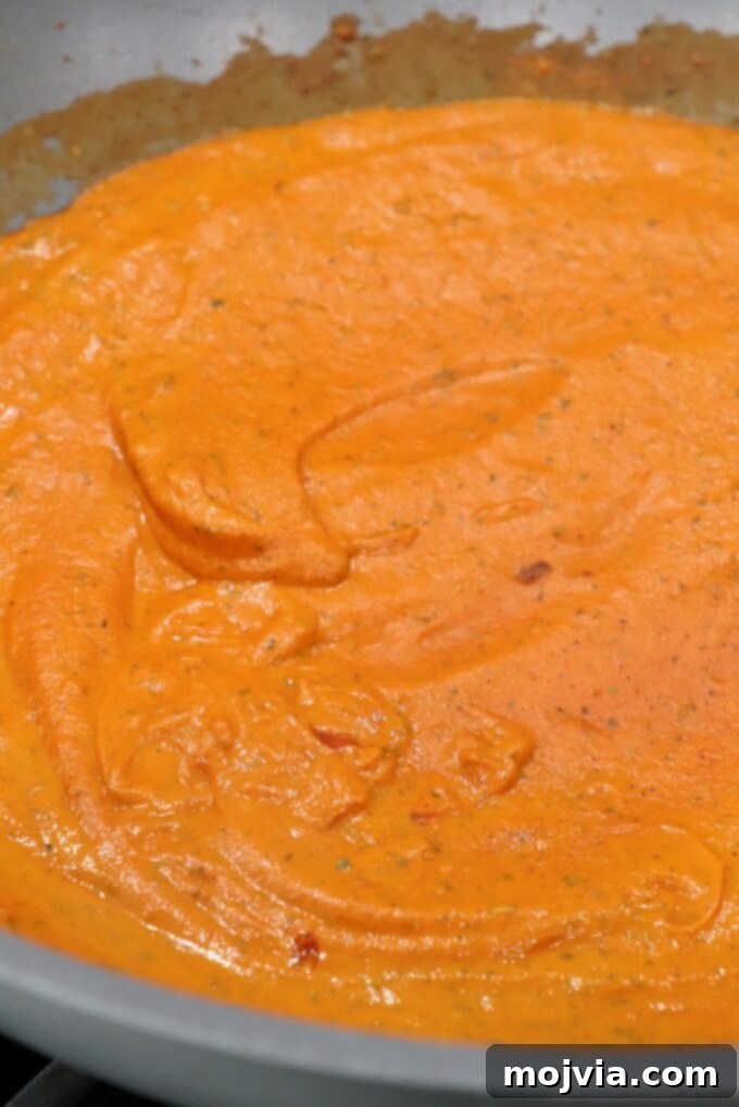 Velvet Butter Chicken 9 butter curry sauce in large skillet