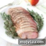 Smoky Apple Chipotle Pork Loin 2 A boneless pork loin is cooked in a delicious combination of chipotle, nutmeg, cloves, maple syrup & apple juice in a sous vide or slow cooker.