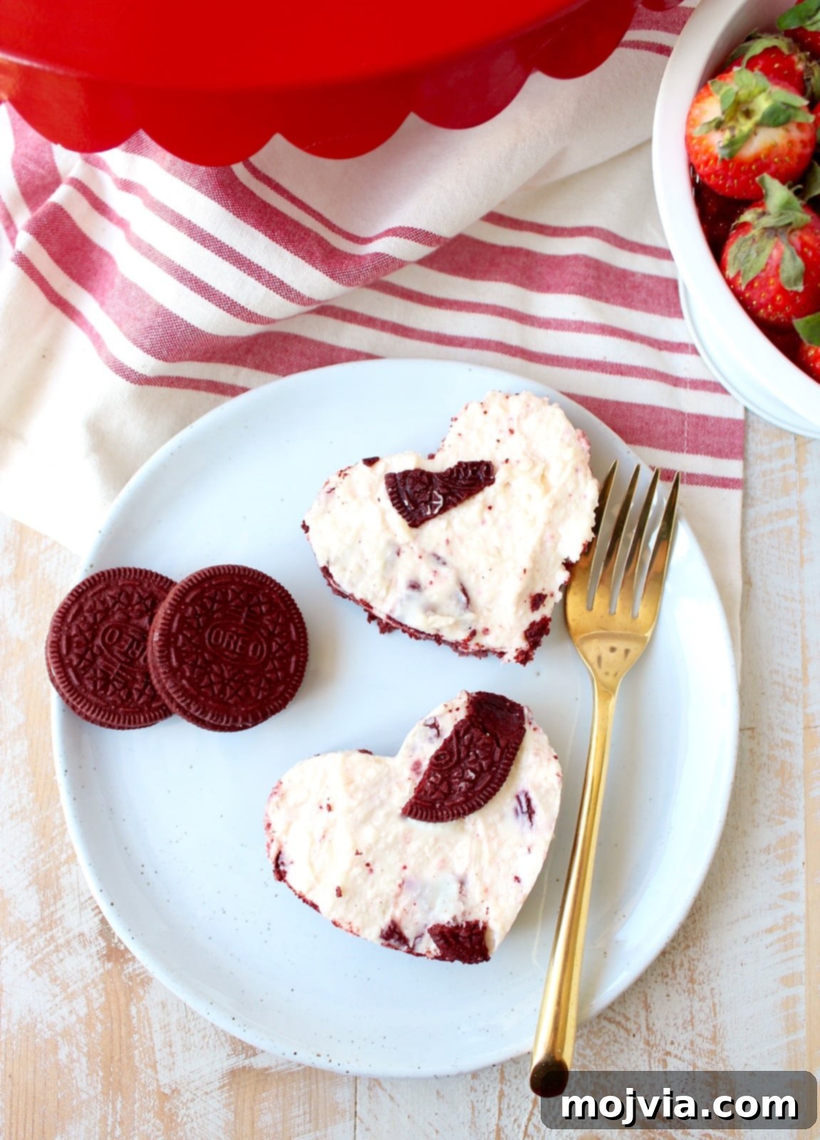 No-bake Red Velvet Oreo cheesecake bars artfully arranged on a serving platter, highlighting their festive and indulgent appeal.