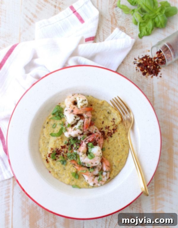 This Gluten Free Italian Shrimp & Polenta Recipe is made entirely in a rice cooker & steamer in only 29 minutes for an easy meal with very little clean up!
