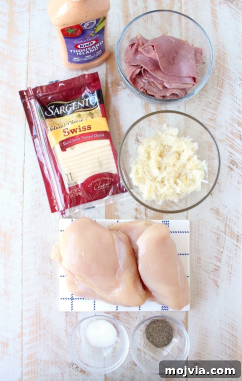 Reuben Chicken Roulade 3 Raw chicken breasts being prepped for stuffing with Reuben ingredients.